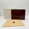 La pochette main Cartier