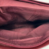 La pochette à dragonne Cartier